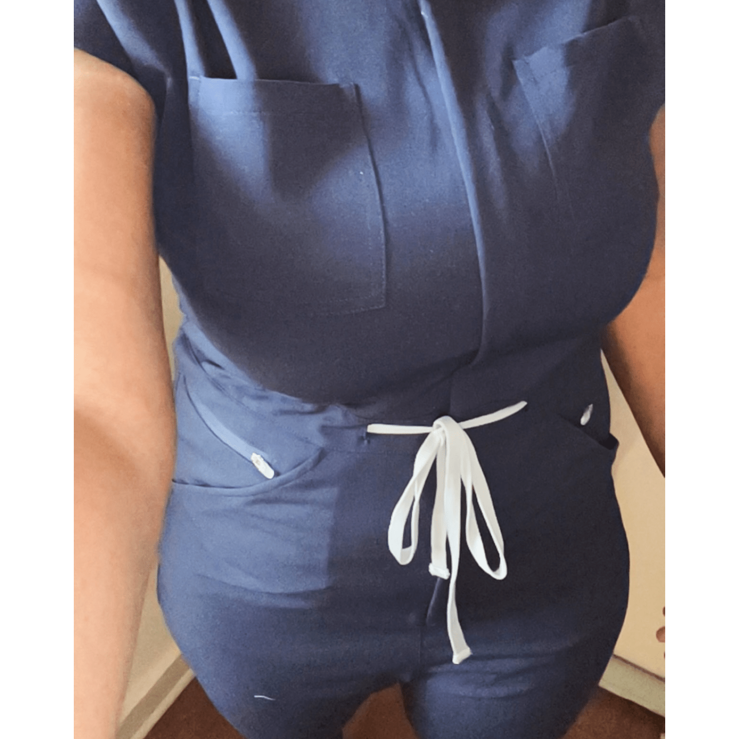 One Piece Scrub Jumpsuit - Nursecaresuites - Online Healthcare BoutiqueScrubs8 - pocket jumpsuitadjustable drawstring jumpsuitall - day comfort scrubs