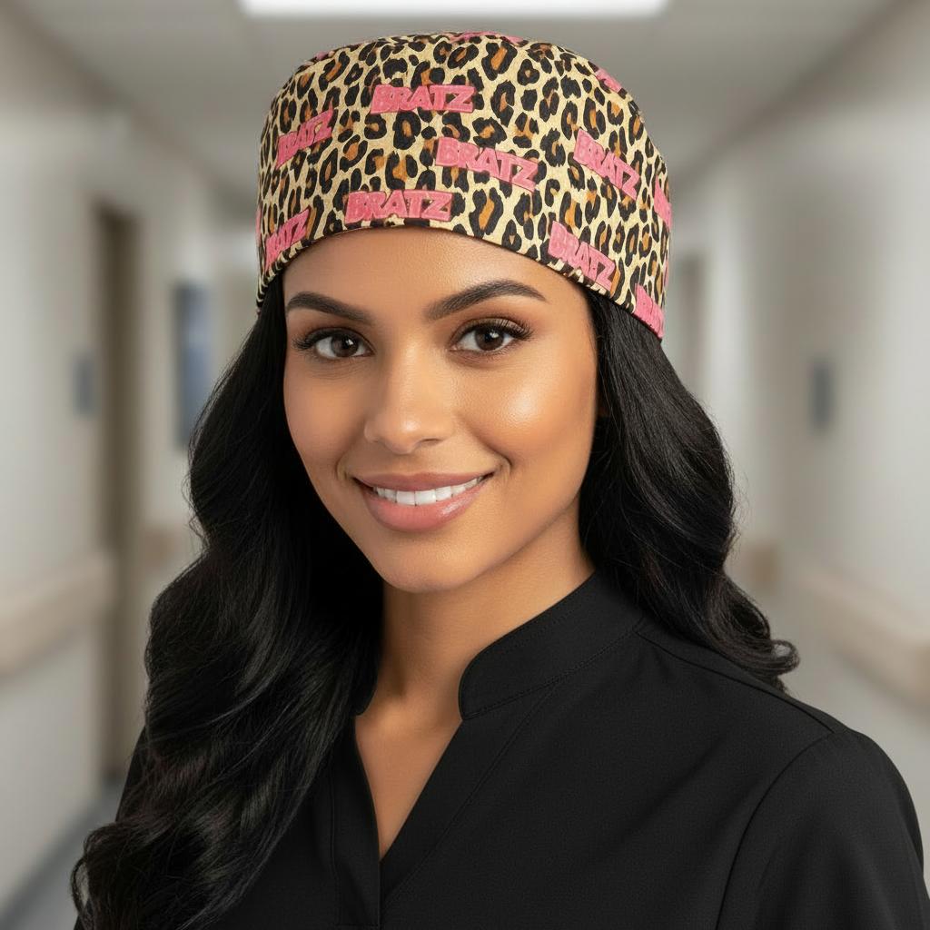 Woman wearing a leopard print scrub cap with 'Bratz' text in a hospital setting